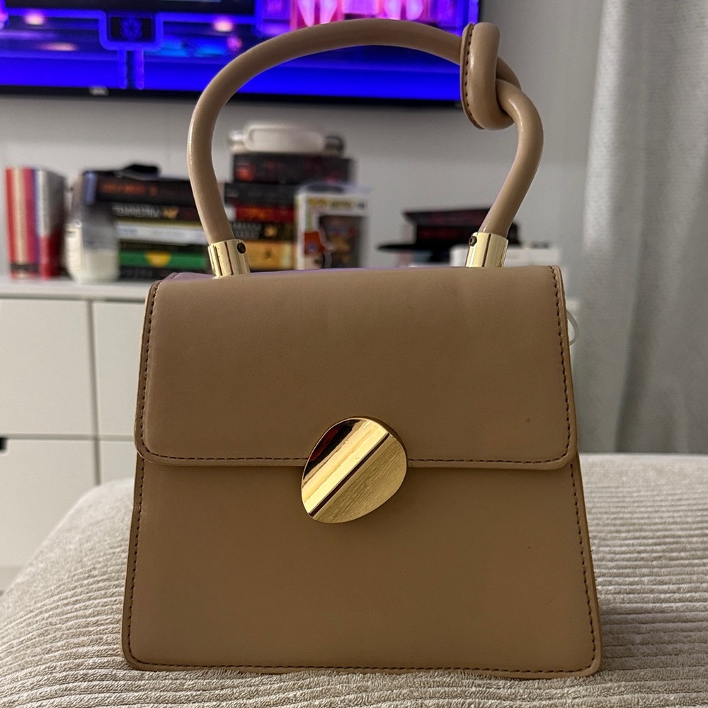 Elegant Tan Handbag with Gold Accent